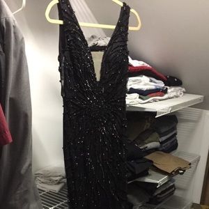 Black sleeveless gown